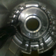 Unbolt the low/reverse clutch piston retainer
